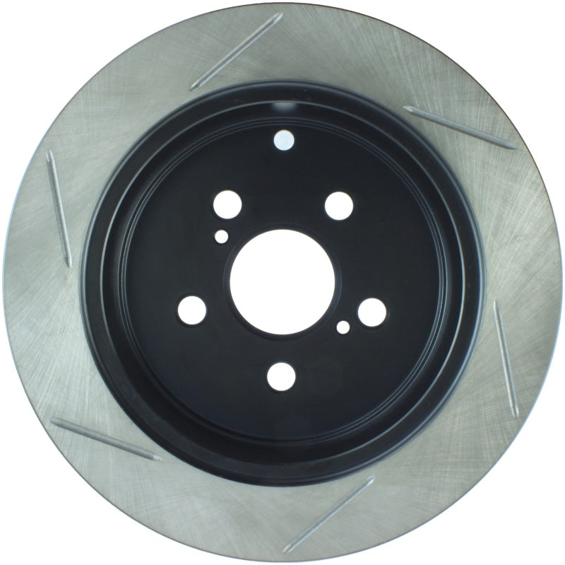 Rotor trasero izquierdo ranurado StopTech Power Slot 01-05 Toyota Celica GT-S/05-09 Scion tC